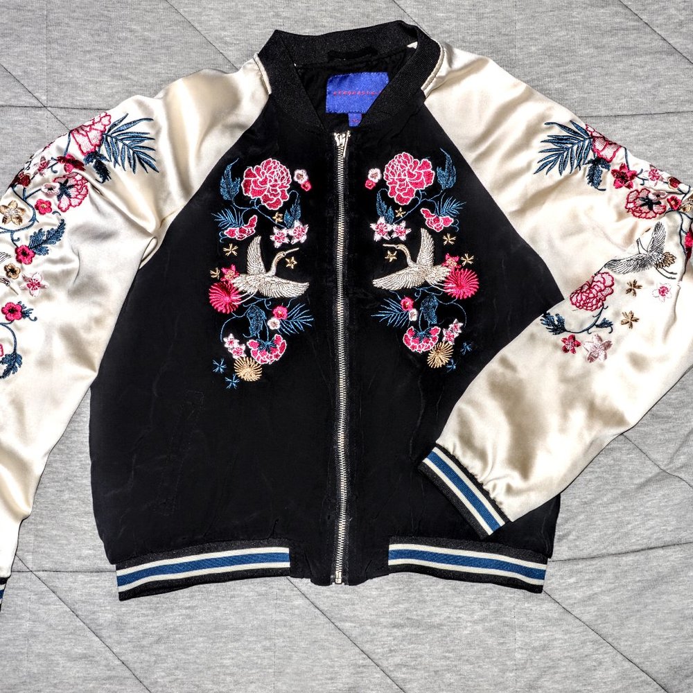 Black and cream embroidered bomber jacket.